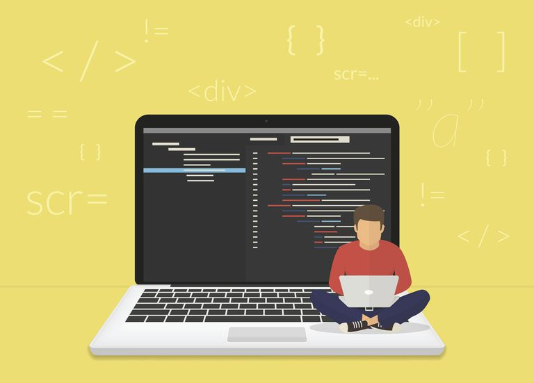Młody programista kodujący nowy projekt