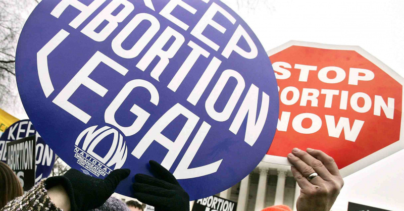 Znaki pro-wyboru i pro-life podczas marszu 2005 w Waszyngtonie.